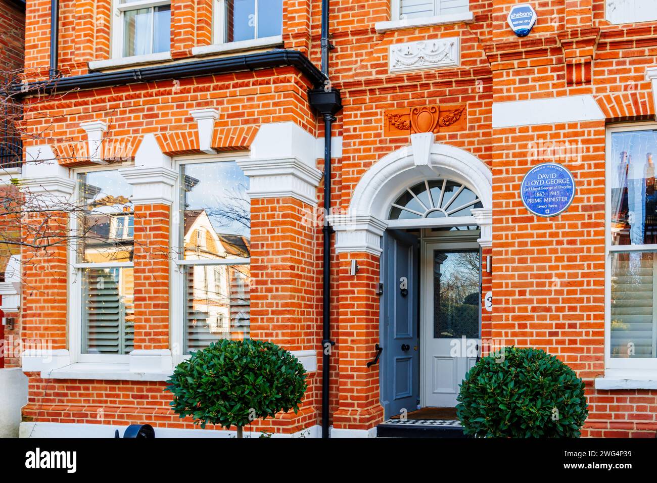 Targa blu sul muro di una casa in Routh Road nel toast rack, Wandsworth, sud-ovest di Londra, casa del primo ministro David Lloyd George 1863-1945 Foto Stock