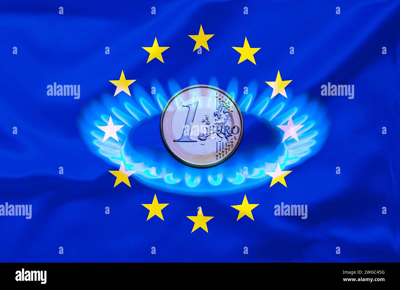 Fiamma del gas con moneta da 1 euro, embargo del gas, prezzi dell'energia, tasso di inflazione, prezzo del gas Foto Stock