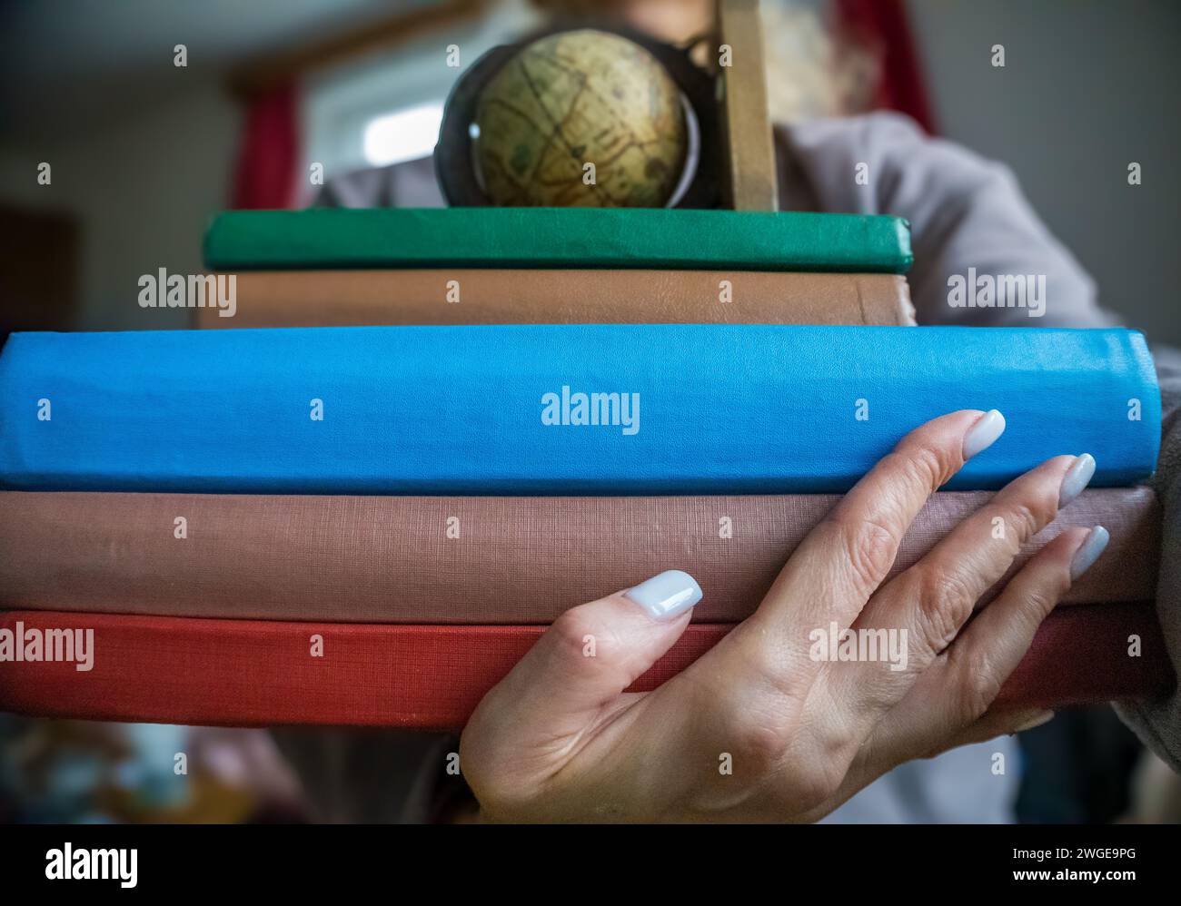 World Globe Books.i laureati studiano all'estero. Scuola di istruzione internazionale Foto Stock