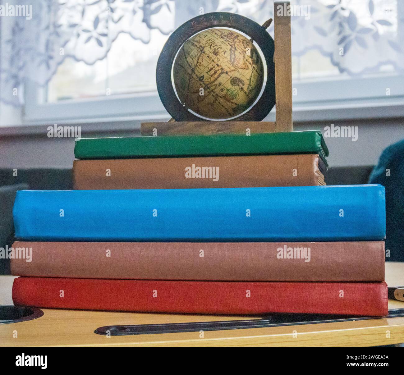 World Globe Books.i laureati studiano all'estero. Scuola di istruzione internazionale Foto Stock