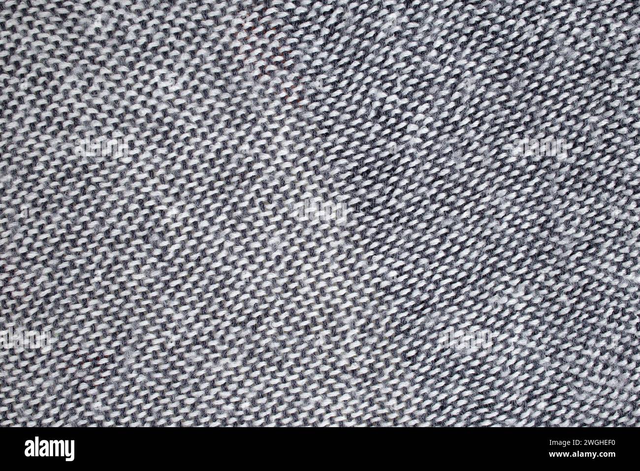 Texture morbida di coperta grigia con linee e puntini, texture astratta Foto Stock