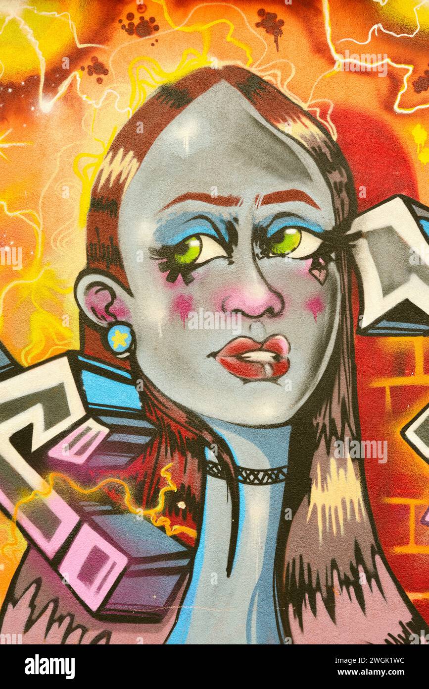 Ritratto di ragazza con occhi verdi graffiti Street art murales a Sofia; Bulgaria; Europa orientale; Balcani; UE Foto Stock