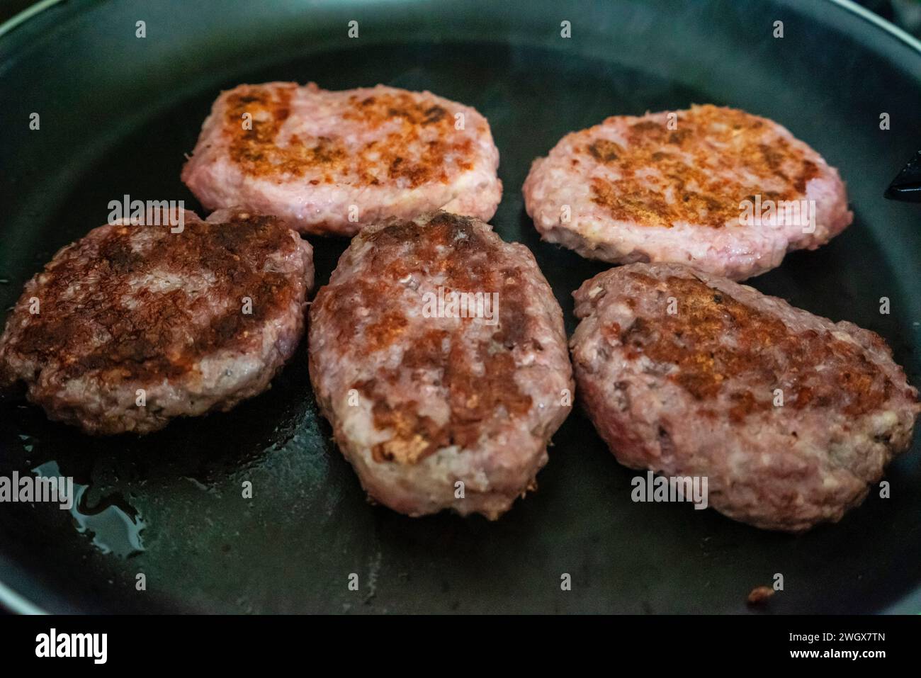 hamburger con brindisi su un grill, maiorca, spagna Foto Stock