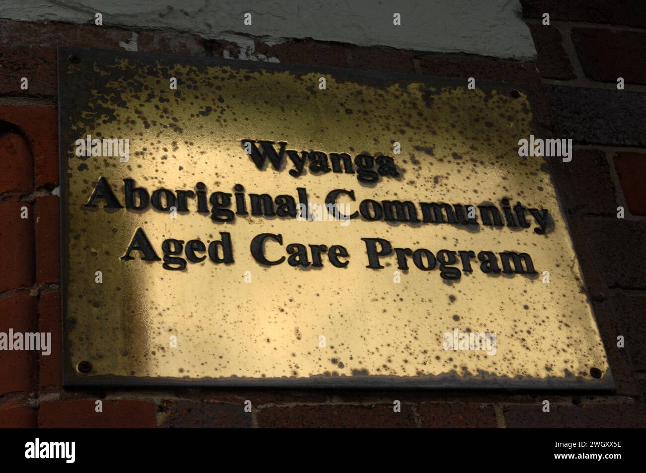 Wyanga, targa del programma per anziani della comunità aborigena, Redfern, Sydney, Australia. Foto Stock