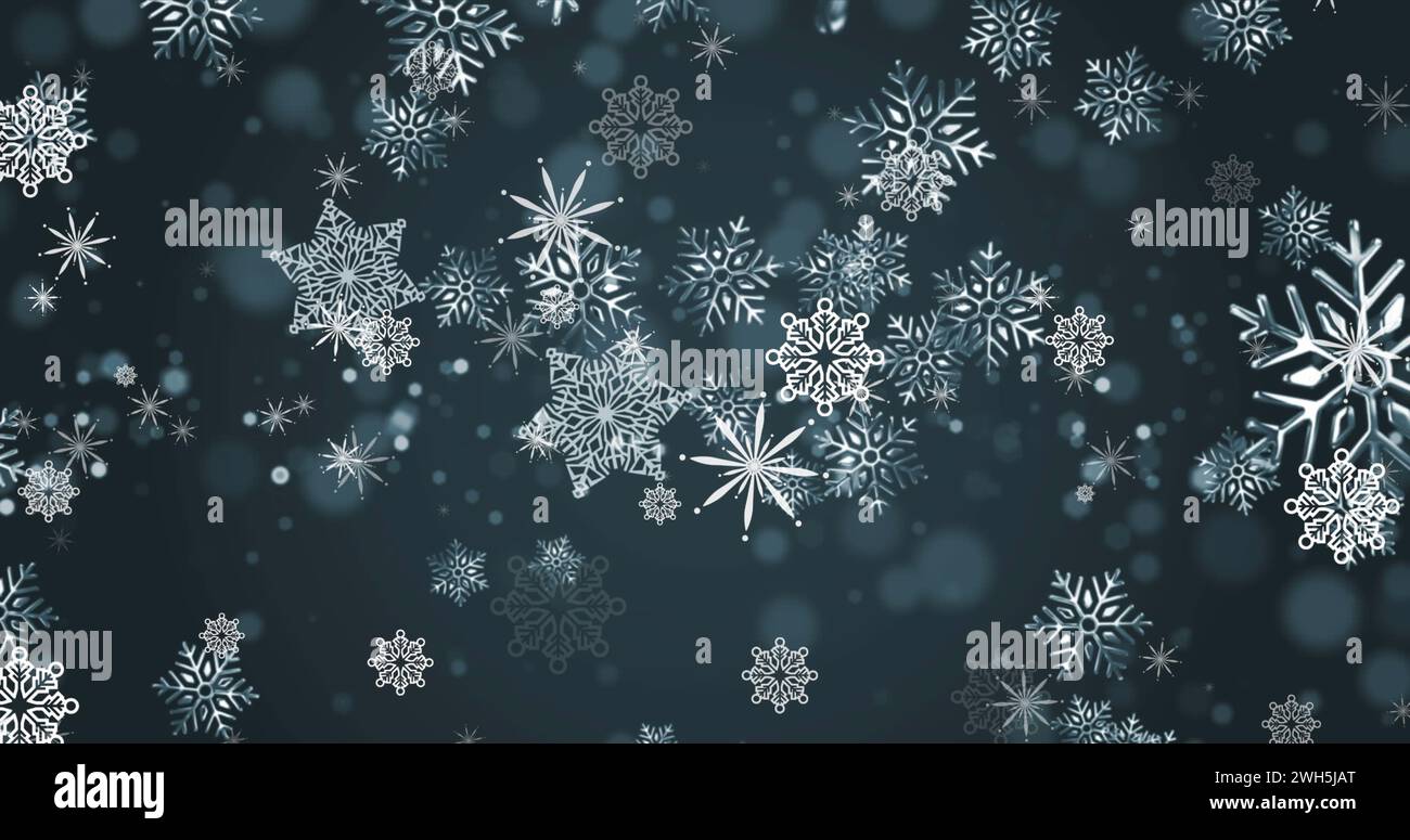 Immagine della neve natalizia che cade su sfondo blu Foto Stock
