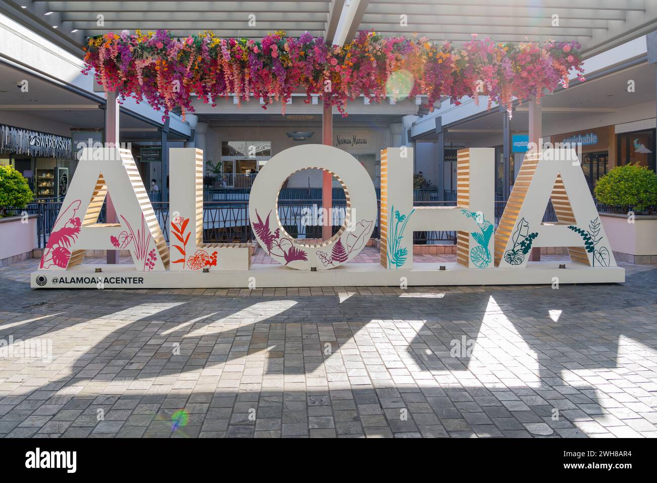 Insegna Aloha al centro commerciale Ala Moana di Honolulu, Hawaii. Foto Stock