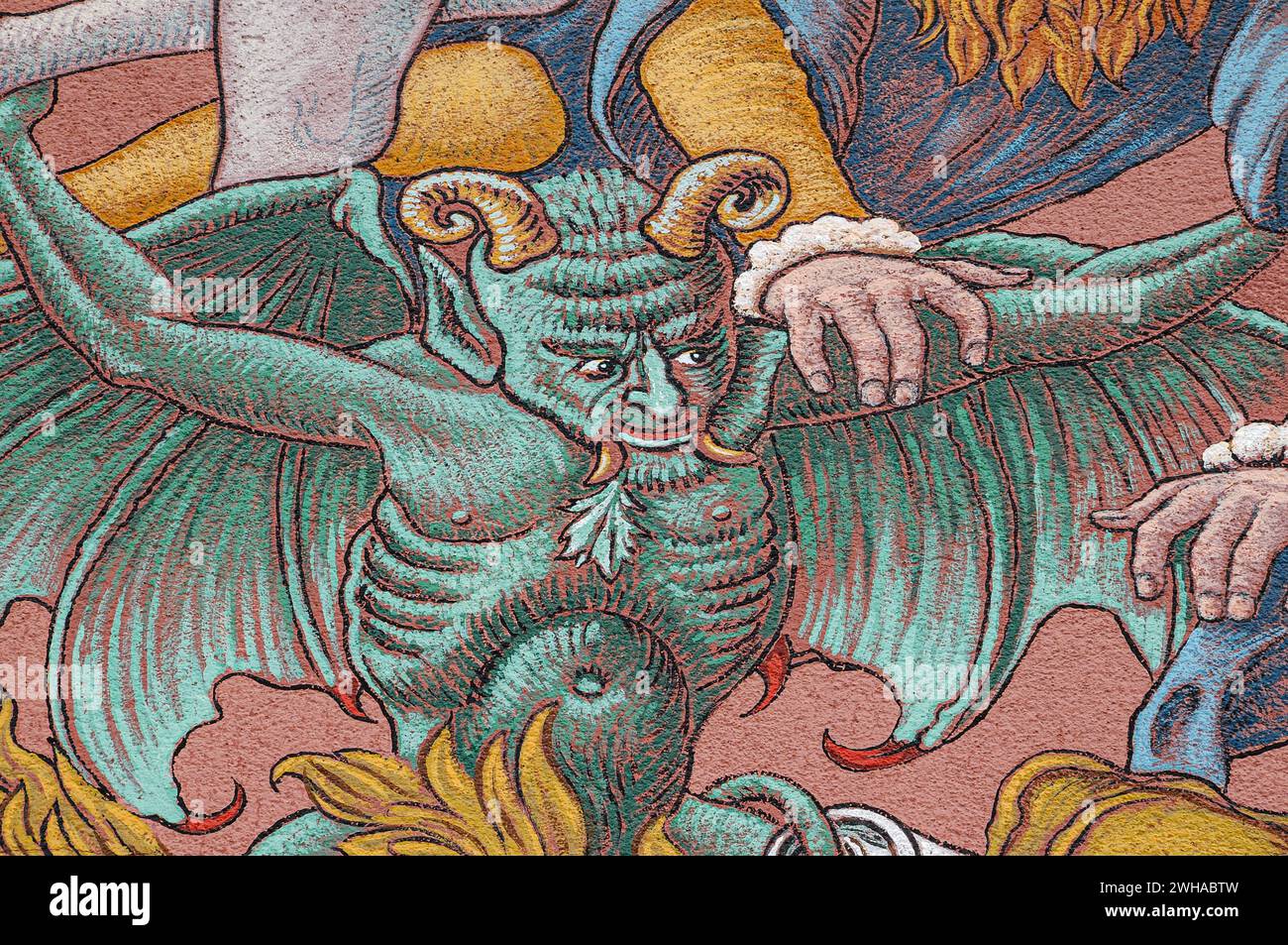 Demone nel dettaglio del murale che segna la morte di Faust o Dottor Faustus. Nell'edificio in cui si dice che Faust sia stato ucciso, il Gasthaus zum Löwen o Hotel Lowen a Staufen im Breisgau, Breisgau-Hochschwarzwald, Baden-Württemberg, Germania. Foto Stock