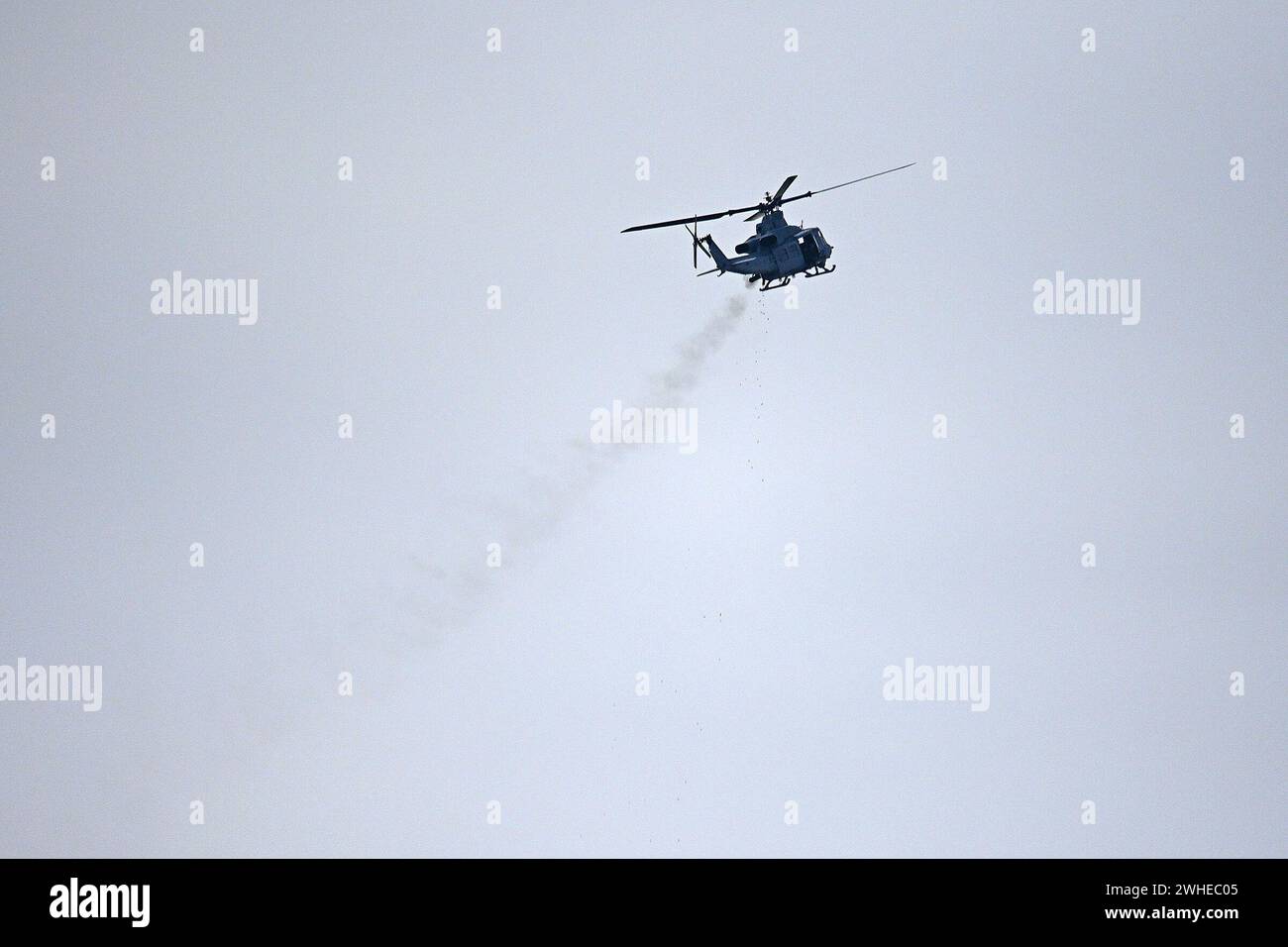 L'unità dei Marine degli Stati Uniti HMLA 773 conduce missioni di artiglieria aerea. Si scontrano con obiettivi con mini cannoni da sbavo, cannoni calibro 50 e razzi da 40 mm sul raggio di azione 59C.. (Immagini fornite dal Centro di supporto alla formazione (TSC) / Dan Amburg) Foto Stock