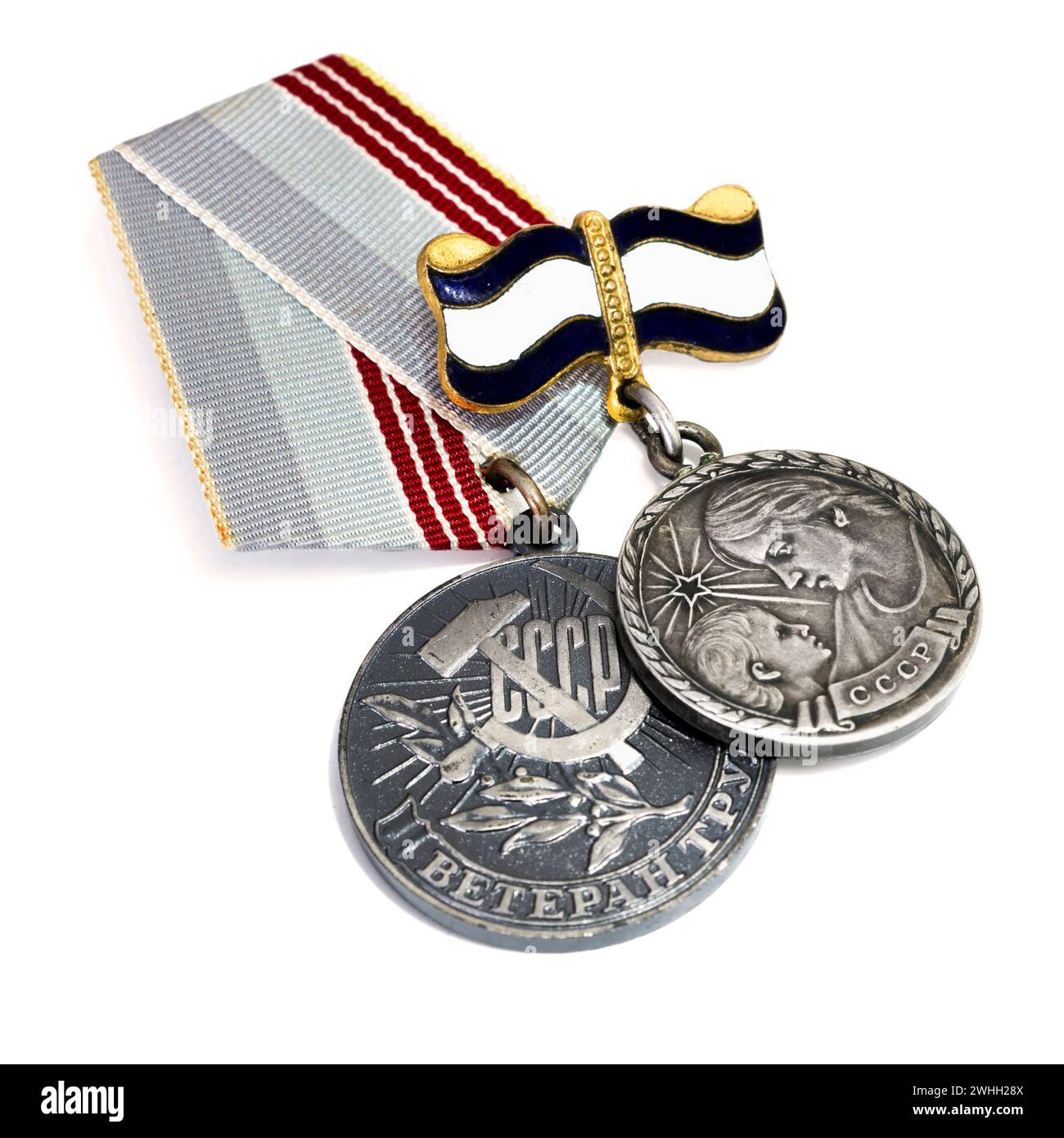 Premi sovietici. Medaglia con iscrizione: Veterano del lavoro. Medaglia alla madre eroina con iscrizione: Foto Stock