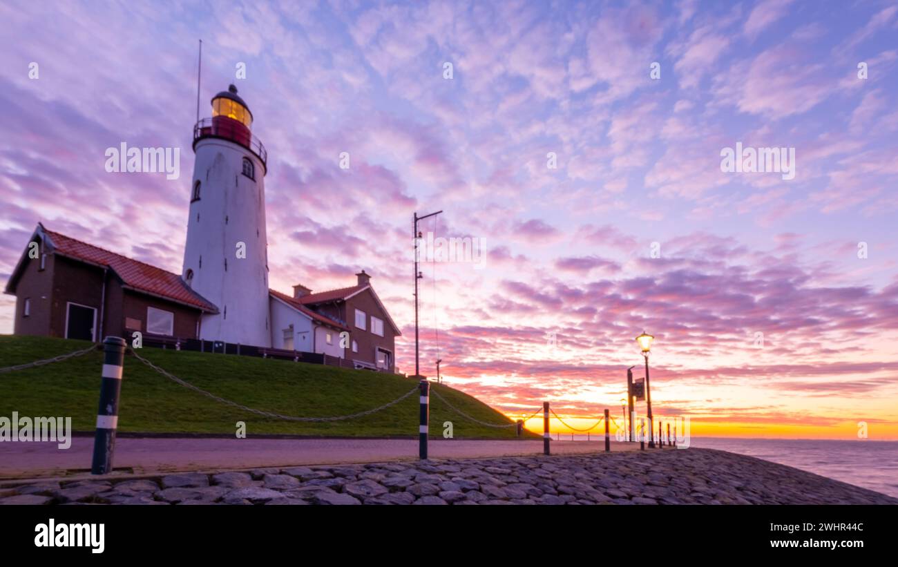 Lighthhouse di Urk Paesi Bassi durante il tramonto nei Paesi Bassi Foto Stock