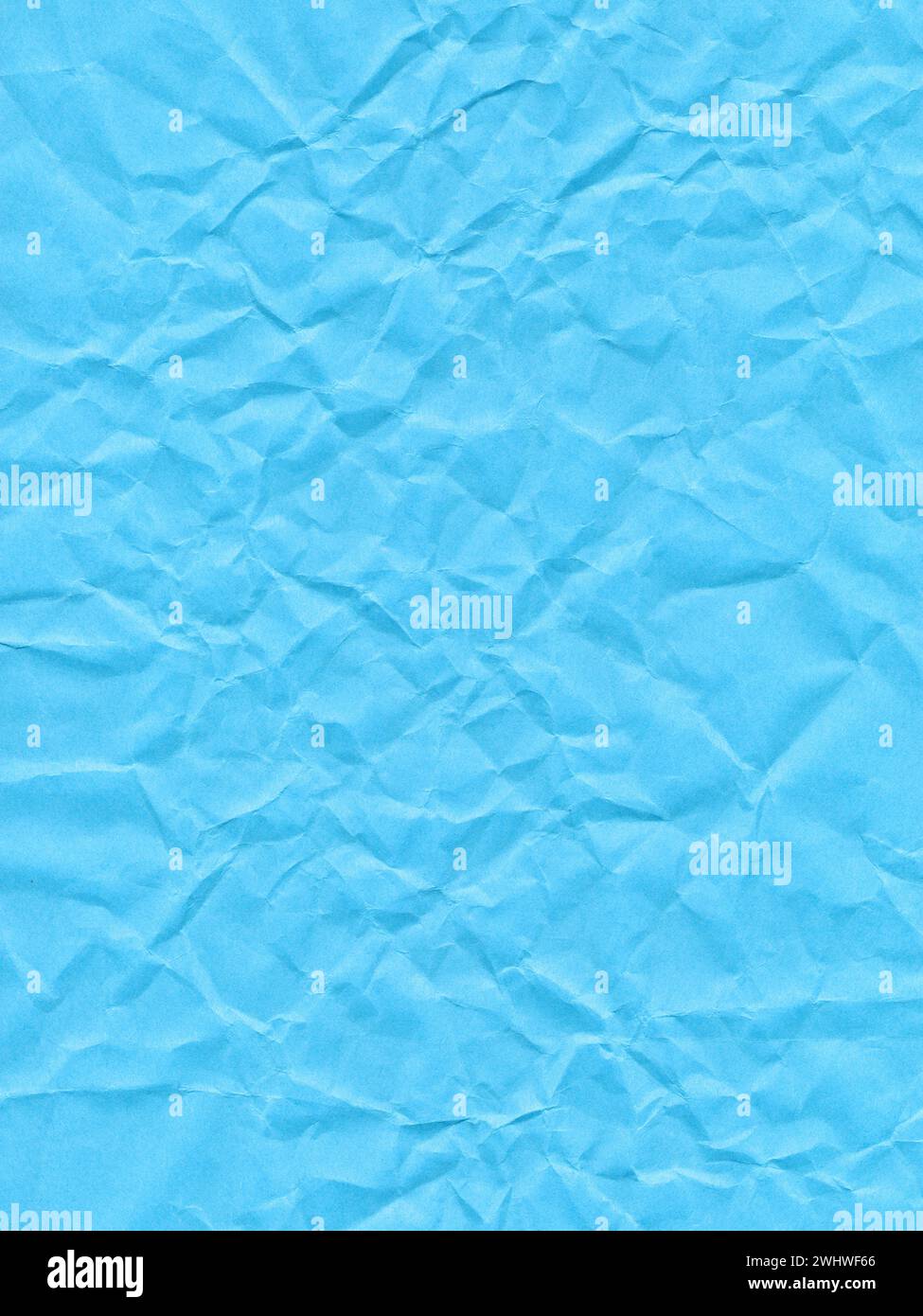 Grana di carta colorata, superficie di un foglio di carta blu scuro Foto Stock