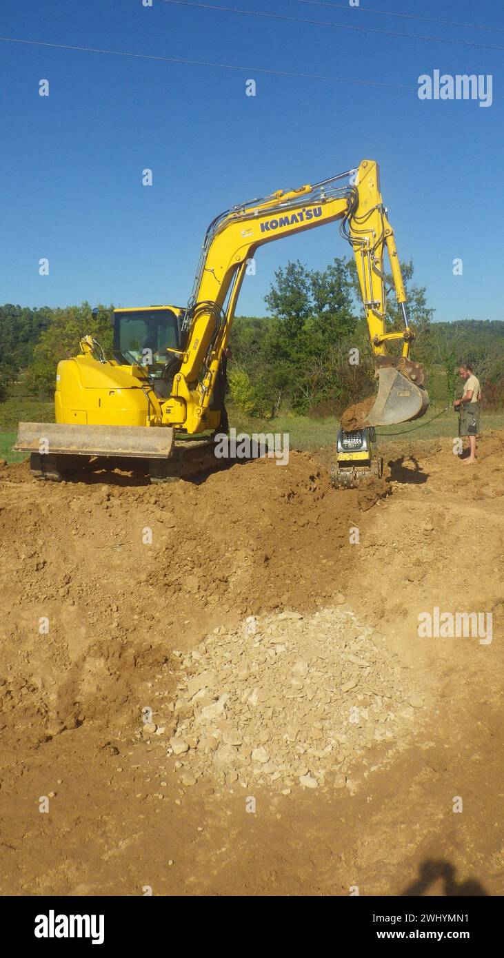 Escavatore Komatsu in cantiere Foto Stock
