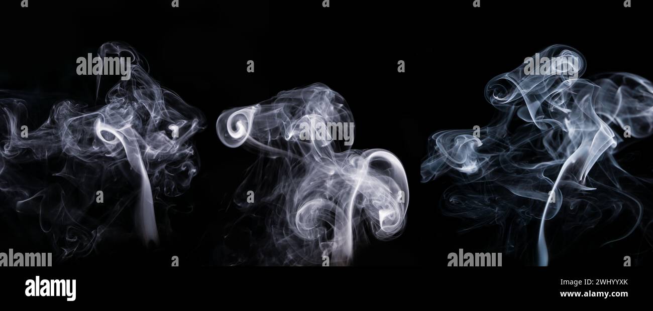 Collezione di getti di fumo su sfondo nero Foto Stock
