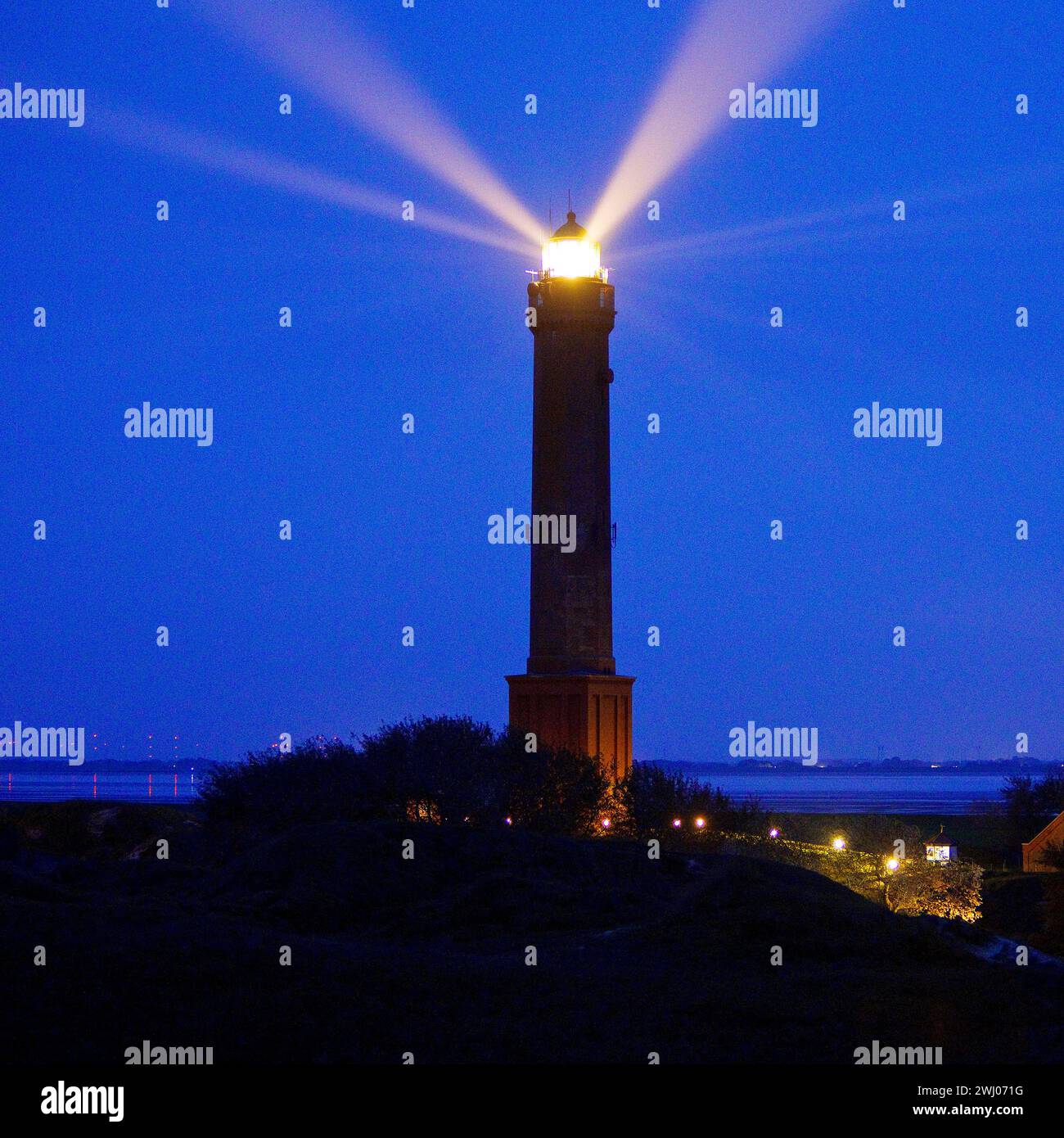 Faro di Grosser Norderney in serata, Isola di Norderney, bassa Sassonia, Germania, Europa Foto Stock