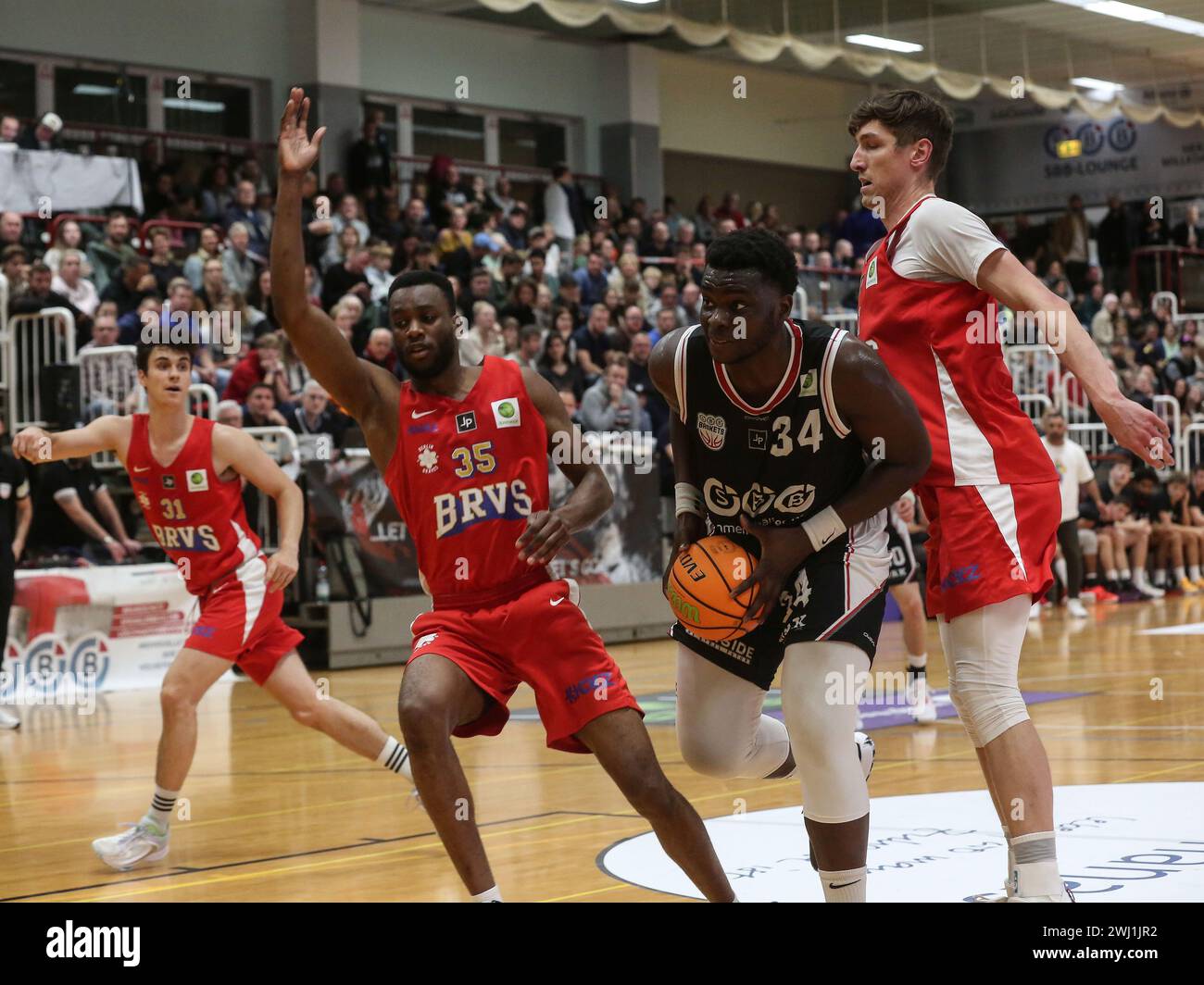 Fabien Kondo FFS, Andreas Seiferth e Jacob Mampuya Berlin Braves 2000 partita del 11/04/2023 Foto Stock