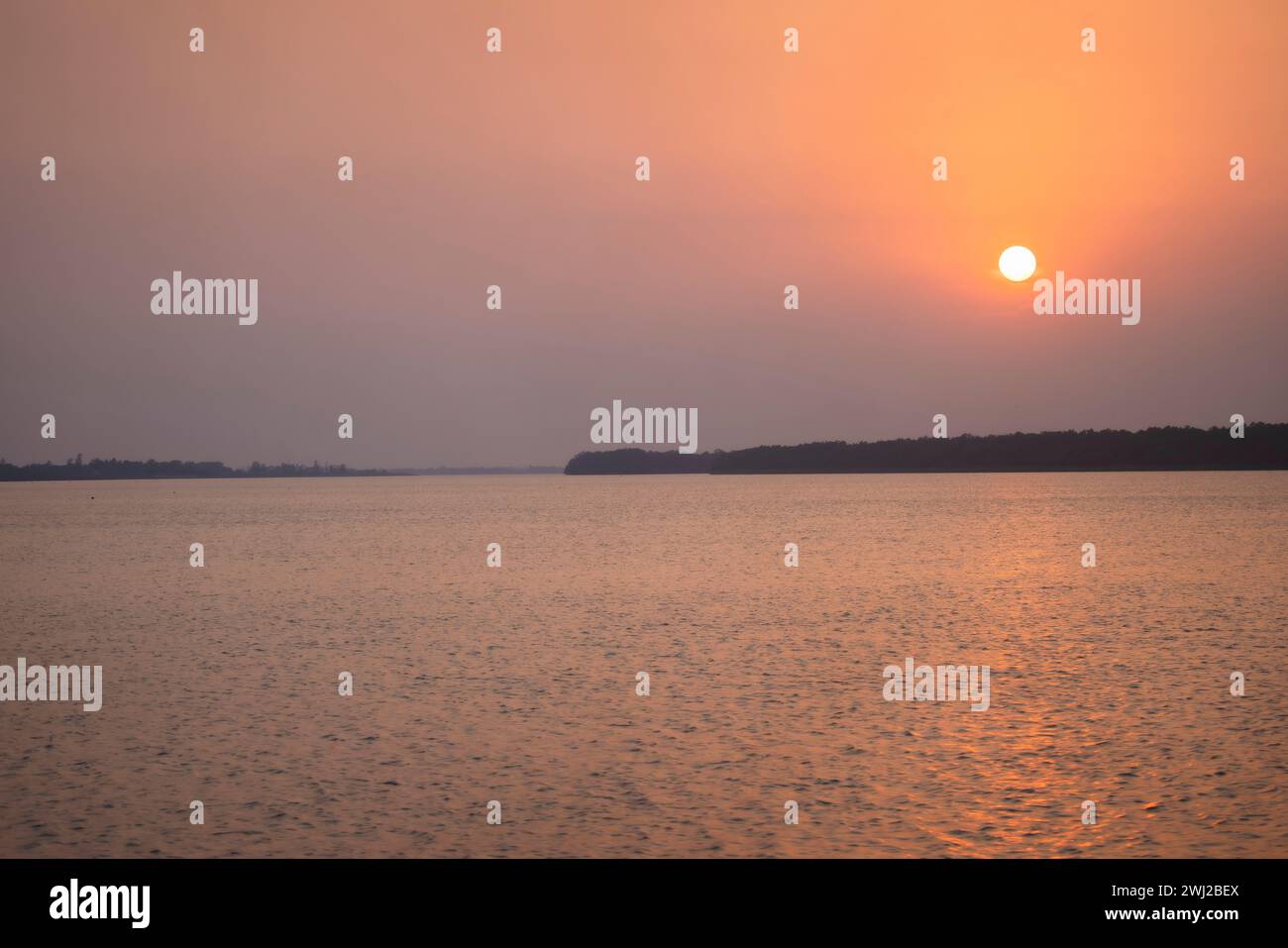 Mare, tramonto, Bhitarkanika, Orissa, India Foto Stock