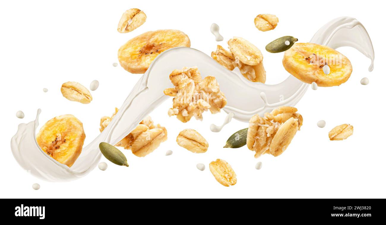 Caduta di granola con spruzzi di latte isolati su sfondo bianco Foto Stock