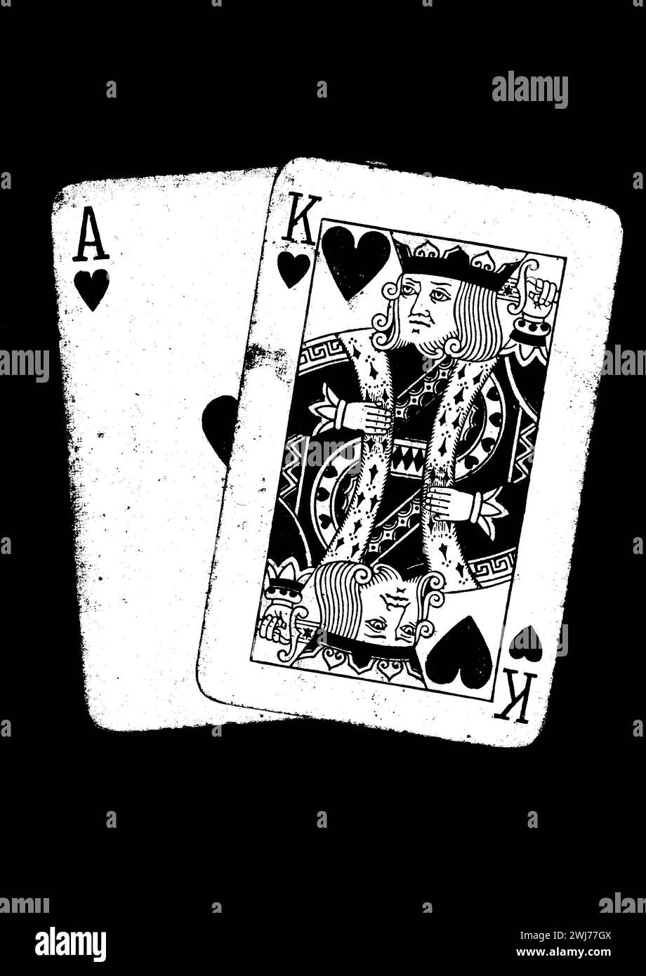 Un paio di carte da gioco vintage in bianco e nero isolate su sfondo nero. Foto Stock