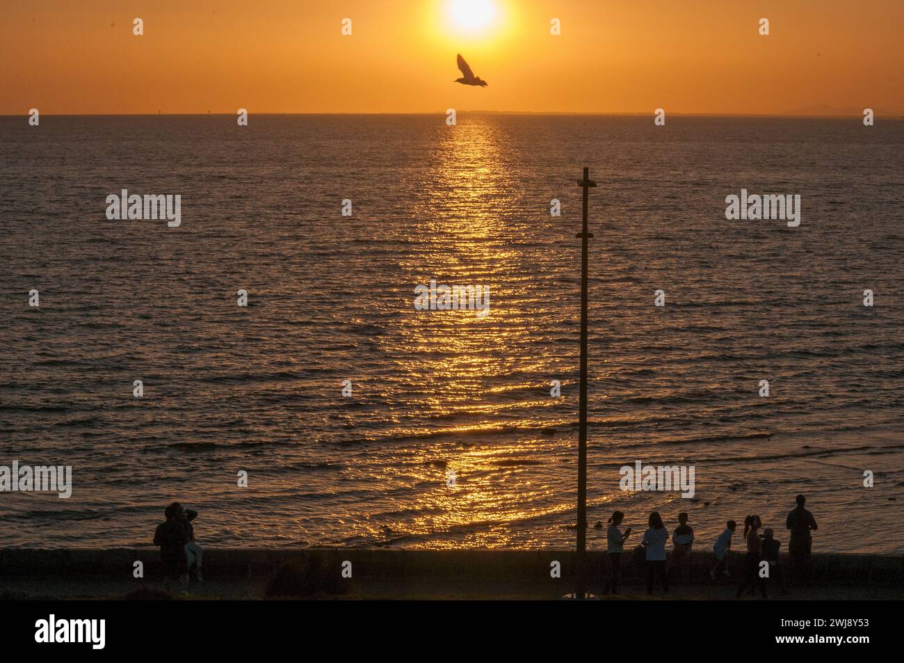 Tramonto su Port Phillip Bay, Melbourne, Australia, visto da Point Ormond su Elwood Beach Foto Stock