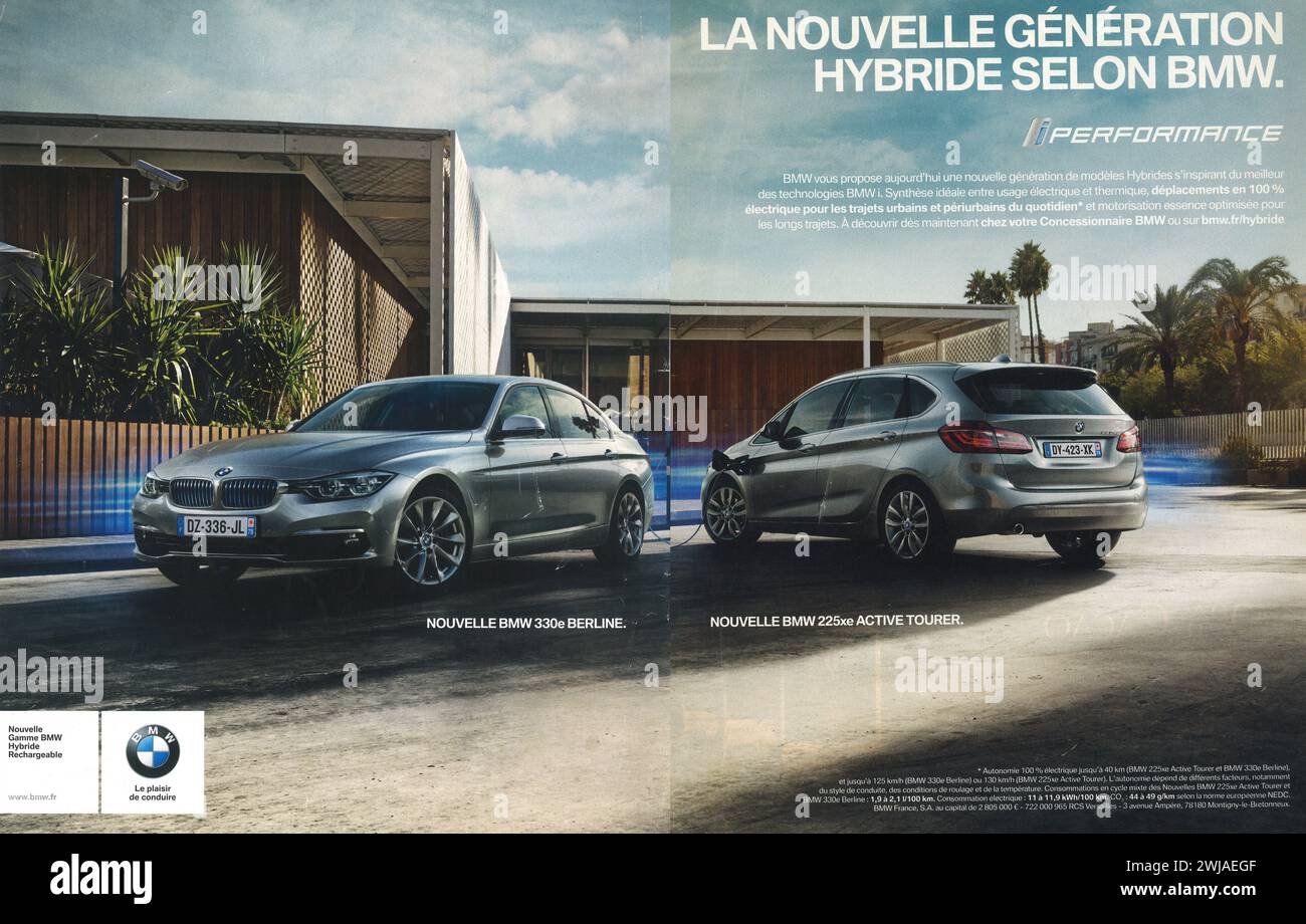 2016 BMW Plug-in Hybrid Electric Vehicles annuncio a mezzo Stampa in una rivista francese. Annunci BMW 330e Berline e BMW 225xe Active Tourer Foto Stock