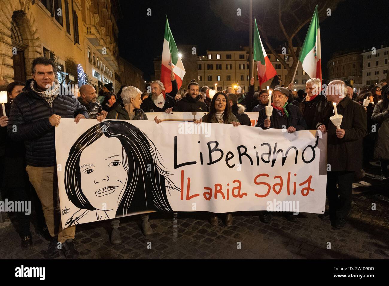 Roma, Italia. 14 febbraio 2024. Uno striscione dedicato a Ilaria Salis durante la processione delle fiaccolate a Roma (foto di Matteo Nardone/Pacific Press) crediti: Pacific Press Media Production Corp./Alamy Live News Foto Stock