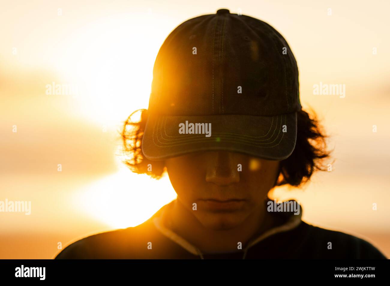 Sunset Glow e silhouette berretto Foto Stock