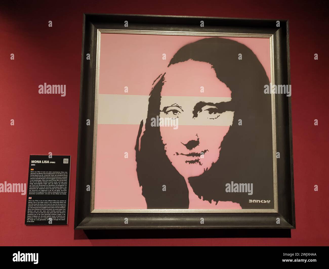Opera d'arte „Monna Lisa (Rosa)“ di Banksy nella mostra „il mistero di Banksy – A Genius Mind“ al Technikum Mülheim il 18 novembre 2022 Foto Stock