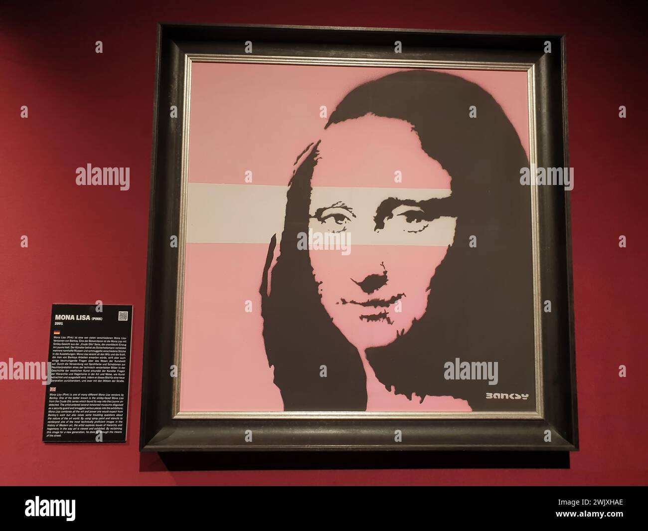 Opera d'arte „Monna Lisa (Rosa)“ di Banksy nella mostra „il mistero di Banksy – A Genius Mind“ al Technikum Mülheim il 18 novembre 2022 Foto Stock