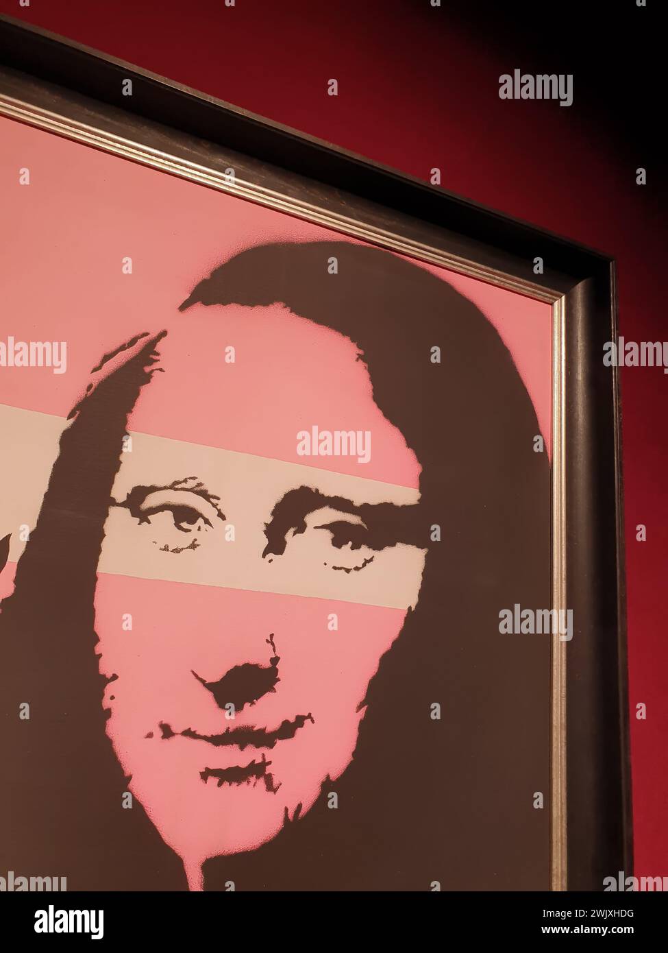 Opera d'arte „Monna Lisa (Rosa)“ di Banksy nella mostra „il mistero di Banksy – A Genius Mind“ al Technikum Mülheim il 18 novembre 2022 Foto Stock