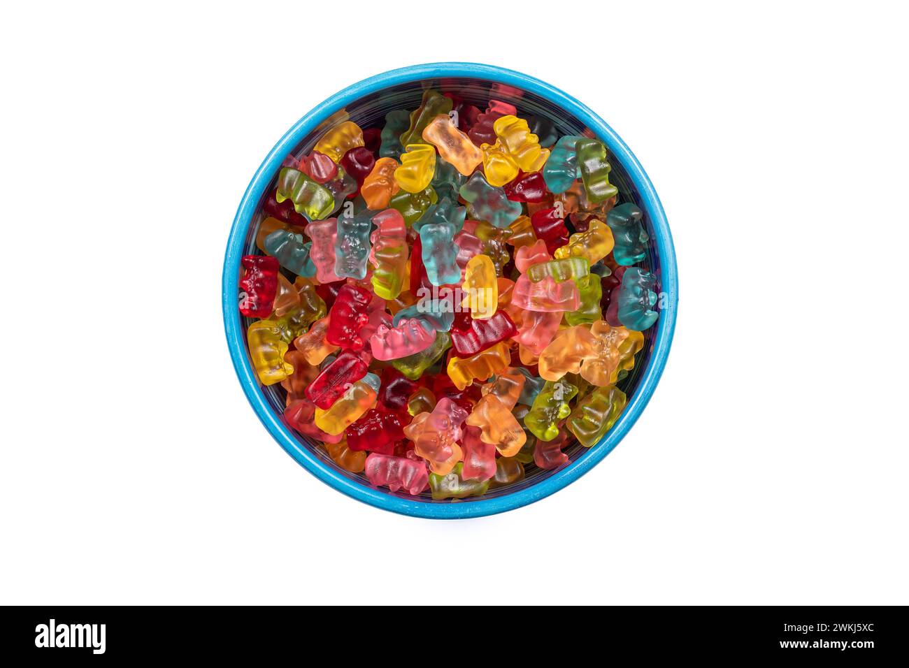 Assortimento di coloratissimi Gummibear in vivace Candy Bowl su sfondo bianco, vista dall'alto. Foto Stock