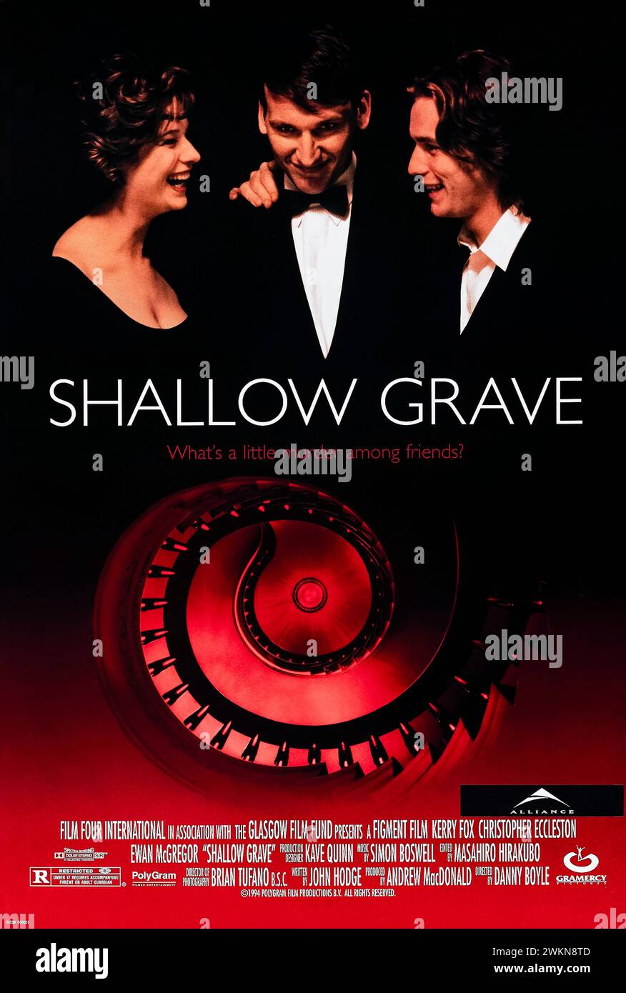 Shallow grave (1994) diretto da Danny Boyle e interpretato da Kerry Fox, Christopher Eccleston e Ewan McGregor. Tre amici scoprono il loro nuovo coinquilino morto ma carico di soldi. Fotografia di un poster originale da 1994 US a un foglio. ***SOLO PER USO EDITORIALE*** credito: BFA / Gramercy Pictures Foto Stock