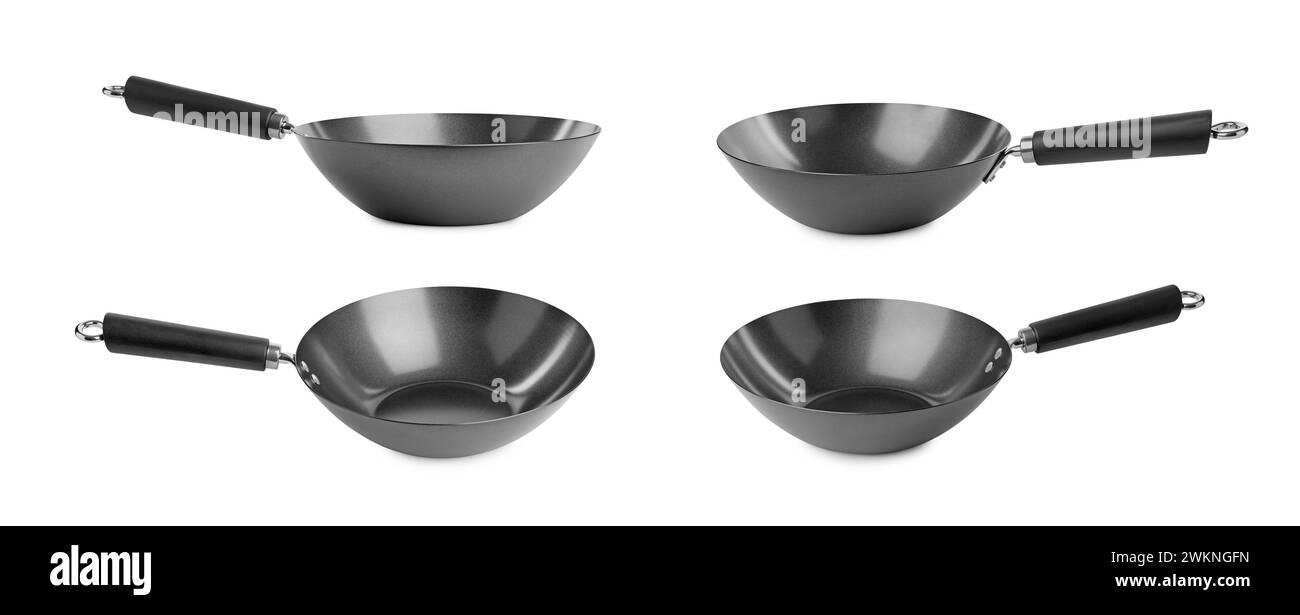 Vuoti woks metallici isolati su bianco, set Foto Stock