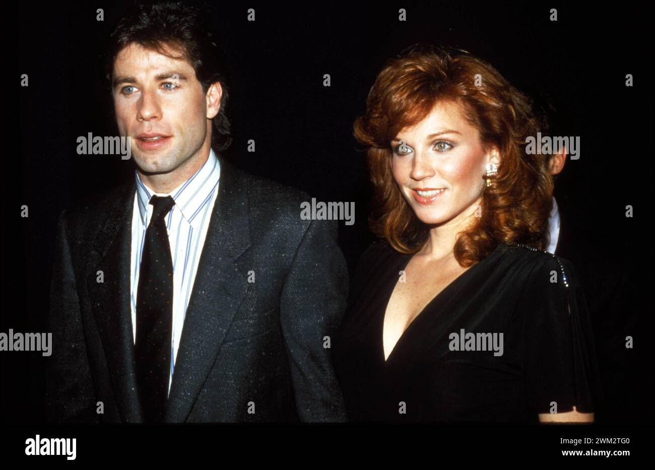 John Travolta Marilu Henner 1985 foto di John Barrett/PHOTOlink/MediaPunch Foto Stock