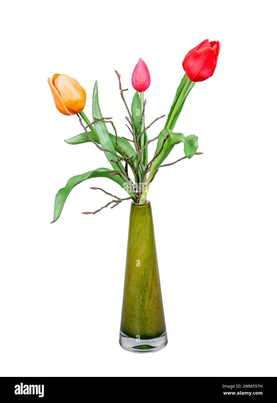 Deco a molla con tulipani artificiali isolati su bianco in un vaso Foto Stock