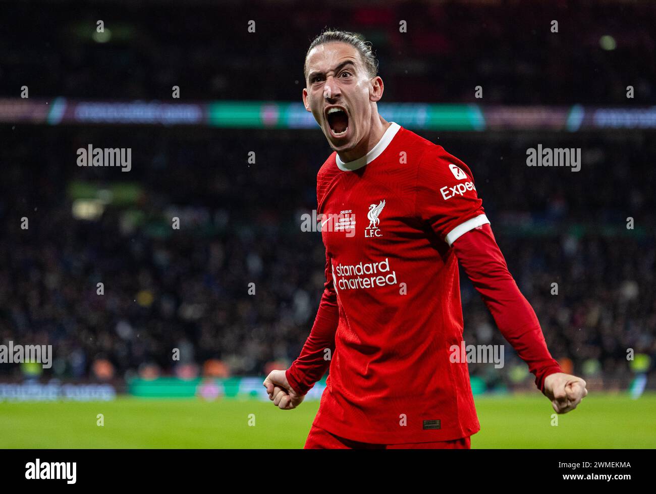 (240226) -- LONDRA, 26 febbraio 2024 (Xinhua) Kostas Tsimikas del Liverpool celebra il gol della sua squadra durante la finale della English Football League Cup tra Chelsea e Liverpool a Londra, in Gran Bretagna, il 25 febbraio 2024. (XINHUA)SOLO PER USO EDITORIALE. NON IN VENDITA PER CAMPAGNE PUBBLICITARIE O DI MARKETING. DIVIETO DI UTILIZZO CON AUDIO, VIDEO, DATI, ELENCHI DI INCONTRI, LOGHI CLUB/LEAGUE O SERVIZI "LIVE" NON AUTORIZZATI. UTILIZZO ONLINE IN-MATCH LIMITATO A 45 IMMAGINI, SENZA EMULAZIONE VIDEO. NON È CONSENTITO L'USO IN SCOMMESSE, GIOCHI O PUBBLICAZIONI PER SINGOLI CLUB/CAMPIONATO/GIOCATORI. Foto Stock