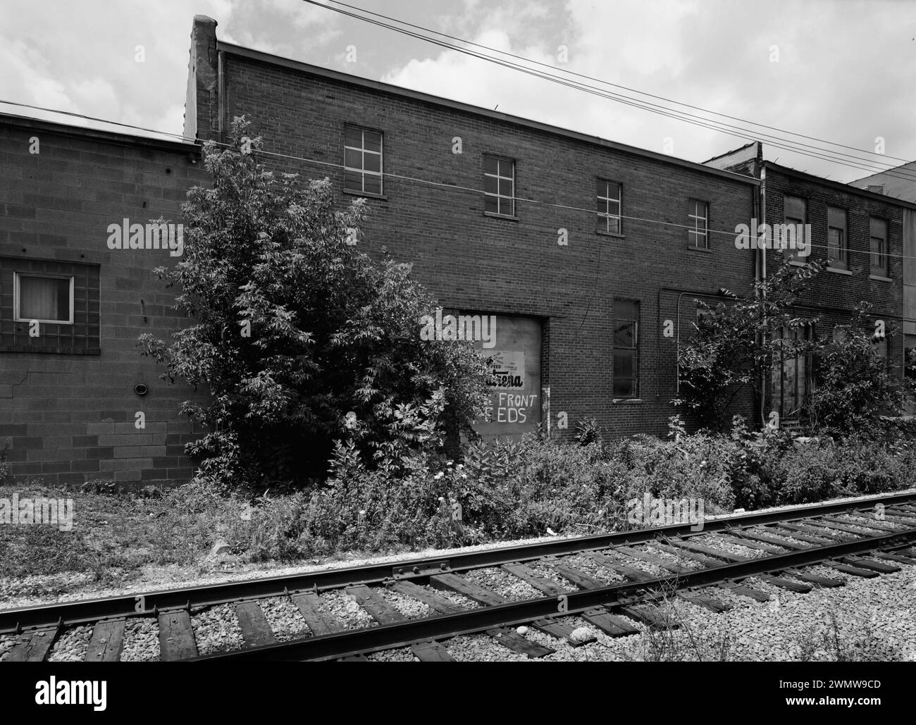 Nord-est posteriore. Vista verso sud - edifici commerciali e industriali, Bush, Robison & Company Warehouse, Dubuque, Dubuque County, Iowa Foto Stock