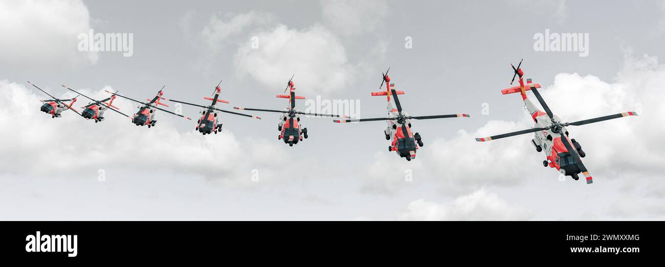 Precision in the Skies: Elicotteri che eseguono un volo di formazione su uno sfondo nuvoloso Foto Stock