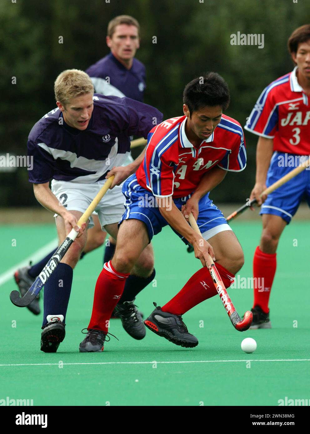 10° qualificazione alla Coppa del mondo di hockey maschile, Peffermill, Edimburgo. 19/7/01. Giappone contro Scozia. Foto Stock