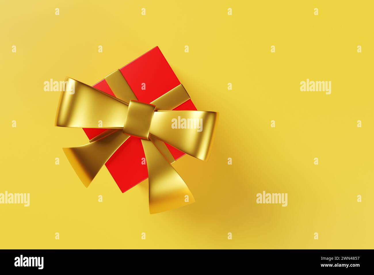 Confezione regalo rossa con nastro dorato su sfondo giallo. Illustrazione come elemento di design per Natale e altre feste di stagione e festività Foto Stock