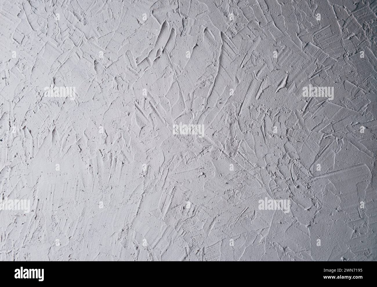 Vecchio muro grigio in cemento. Struttura in calcestruzzo, primo piano. Struttura di fondo di moderne pareti grigie in cemento. Muro fatto di blocchi. Struttura delle colonne intonacate. Foto Stock