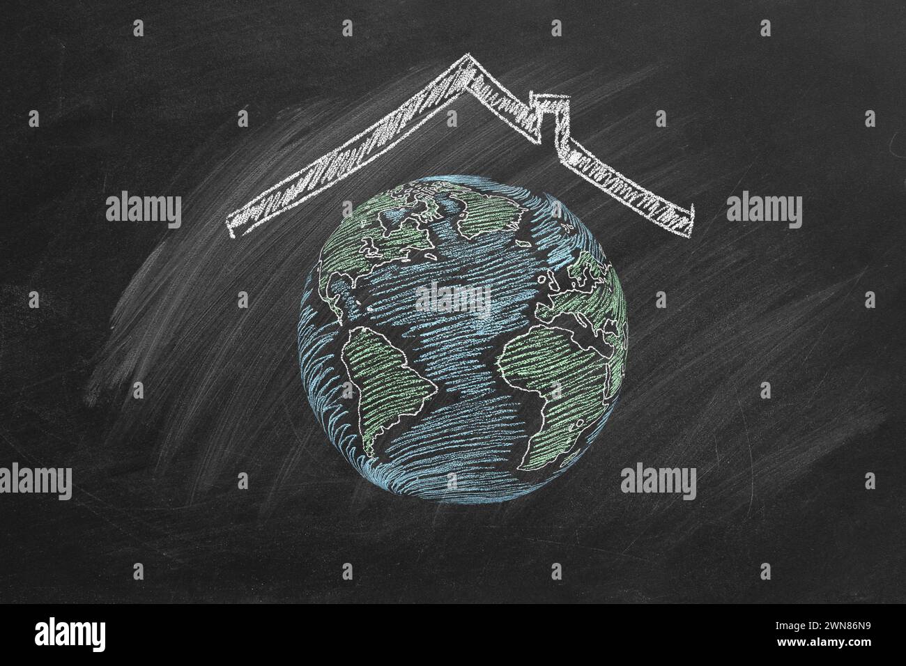 Globo mondiale con tetto. Salvare il mondo. Illustrazione disegnata con gesso. Concetto di giornata della Terra. Foto Stock