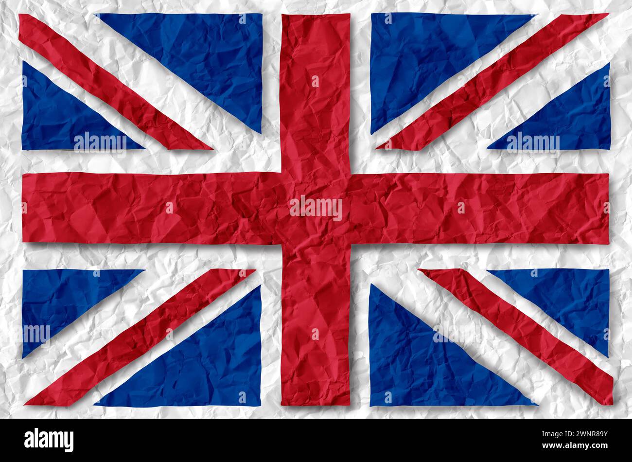 Great Britain Paper Flag come un vecchio simbolo britannico vintage del patriottismo e della cultura inglese su un antico governo del Regno Unito Foto Stock
