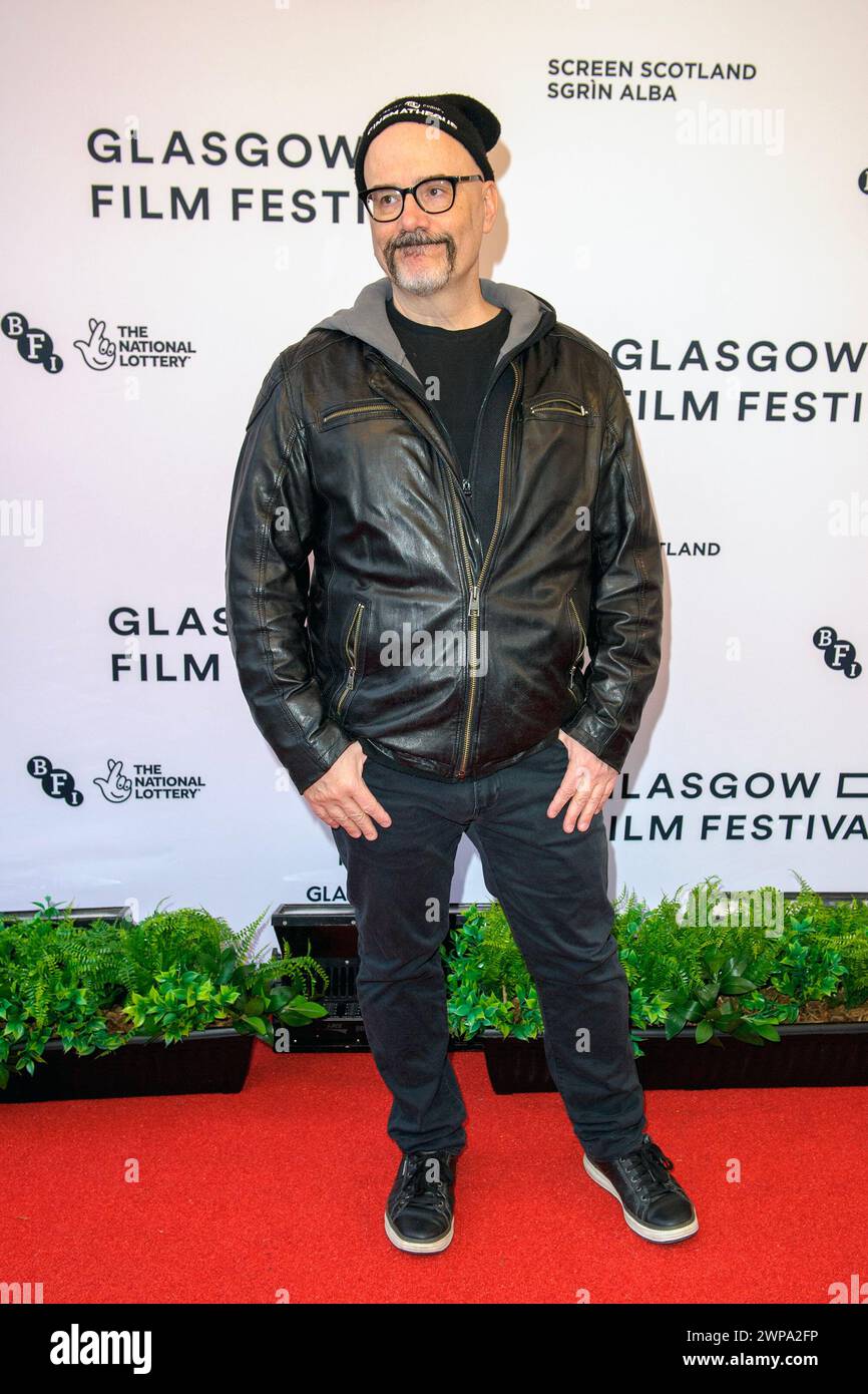 Glasgow, Scozia, Regno Unito. 3 marzo 2024. Il regista Sean Garrity, sul tappeto rosso durante una chiamata fotografica per la premiere del film britannico The Burning Season, al t Foto Stock