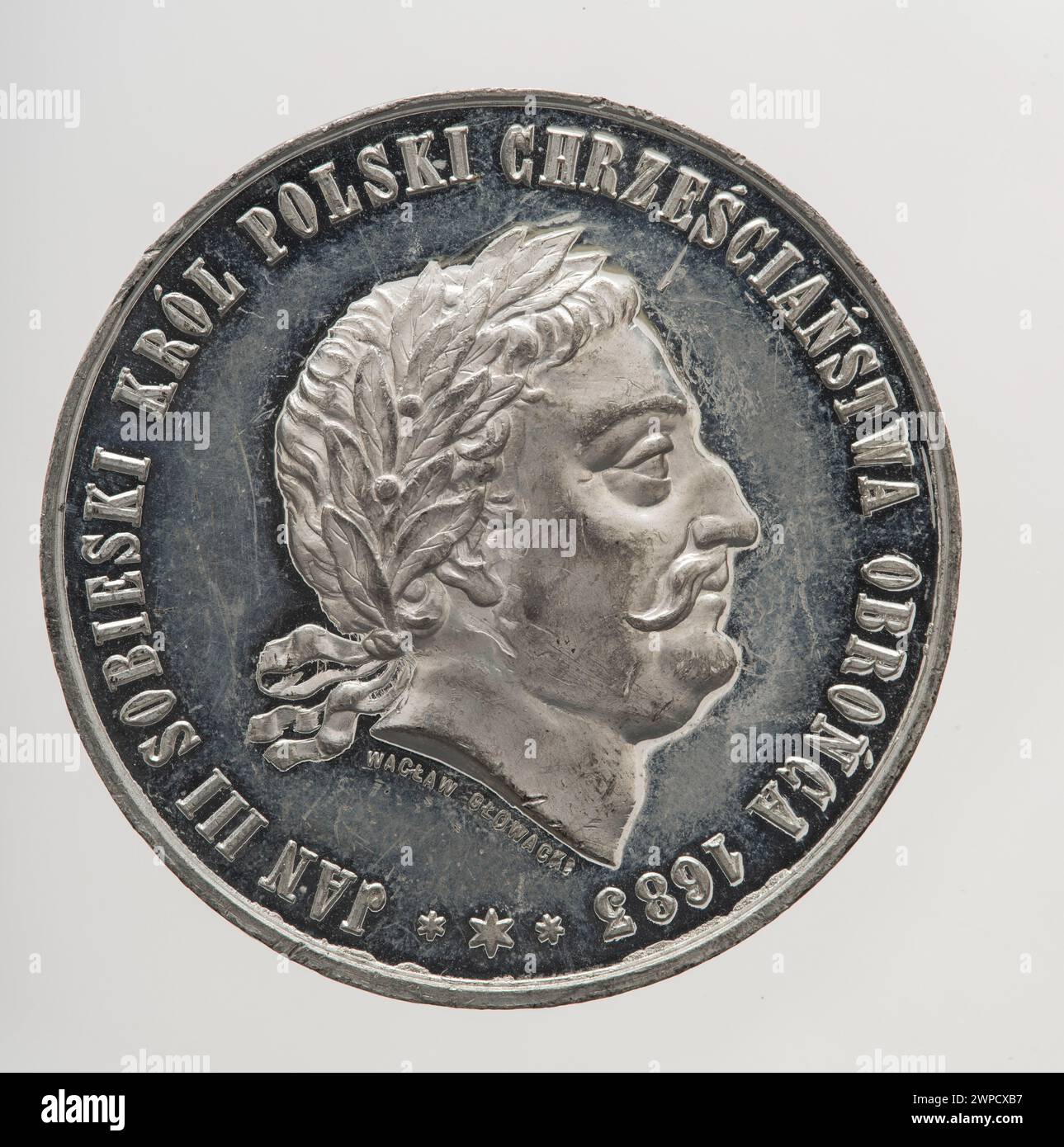 Questa medaglia del 1883 di Felicjan Wojtych commemora il 200° anniversario del rilievo viennese, caratterizzato da motivi storici e decorazioni simboliche in rilievo. Foto Stock