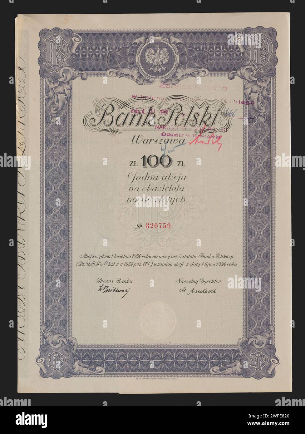 Un certificato azionario rilasciato dalla Banca di Polonia nel 1934, stampato a Varsavia, che rappresenta la proprietà dell'istituto finanziario. Foto Stock