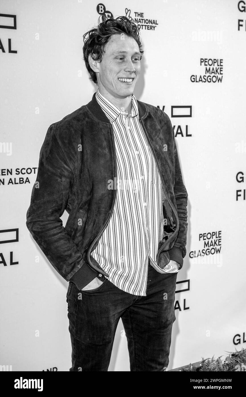 Glasgow, Scozia, Regno Unito. 7 marzo 2024. L'attore, George MacKay, sul tappeto rosso a una chiamata fotografica per una proiezione sold-out di The Beast, al Glasgow Foto Stock