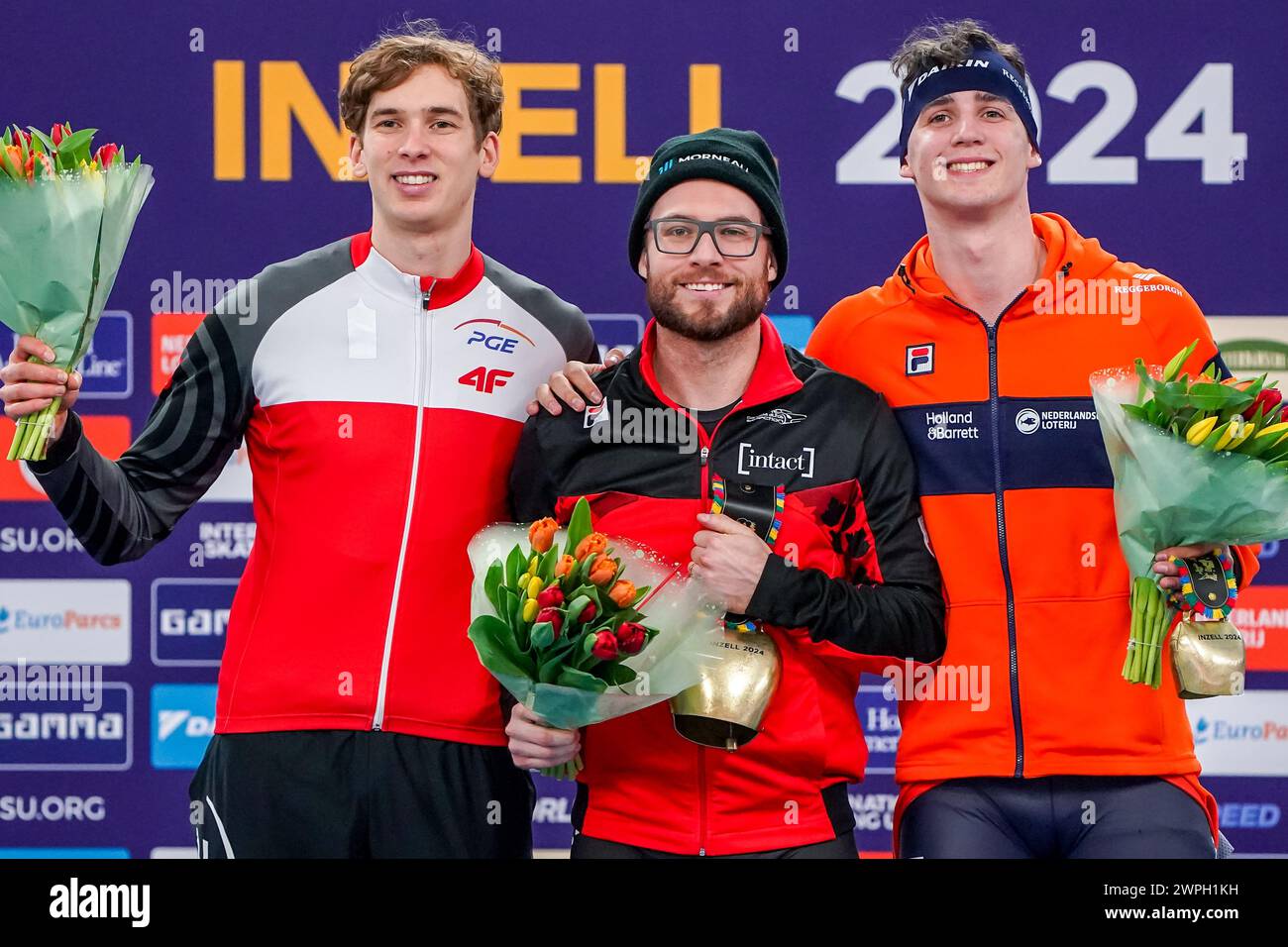 Inzell, Germania. 7 marzo 2024. INZELL, GERMANIA - 7 MARZO: Marek Kania della Polonia, Laurent Dubreuil del Canada, Jenning De Boo dei Paesi Bassi gareggiano sulla tappa maschile 500m 1e durante i Campionati mondiali ISU di pattinaggio di velocità Sprint alla Max Aicher Arena il 7 marzo 2024 a Inzell, Germania. (Foto di Andre Weening/Orange Pictures) credito: Orange Pics BV/Alamy Live News Foto Stock