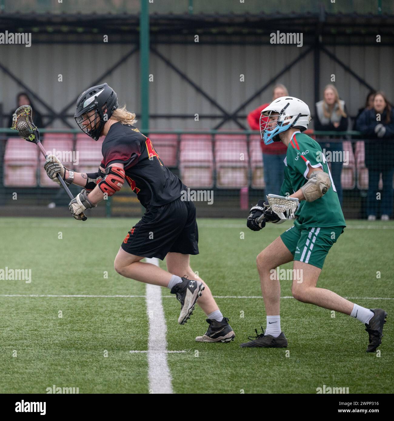 Lacrosse competitive Action Foto Stock