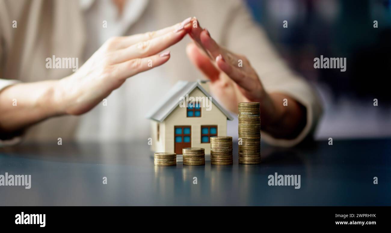 Assicurazione e protezione immobiliari. Aumento dei prezzi Foto Stock