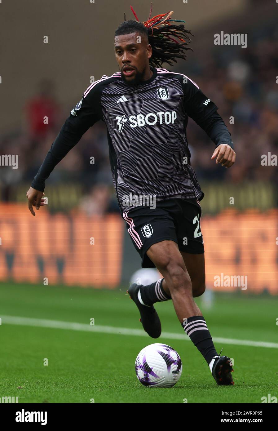 Wolverhampton, Regno Unito. 9 marzo 2024. Alex Iwobi del Fulham in azione durante la partita di Premier League a Molineux, Wolverhampton. Il credito per immagini dovrebbe essere: Cameron Smith/Sportimage Credit: Sportimage Ltd/Alamy Live News Foto Stock